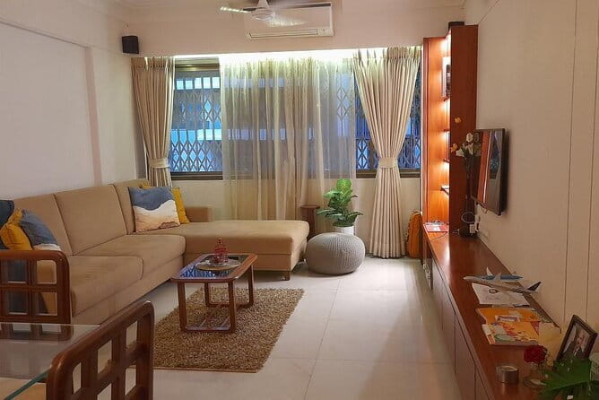 Authentic Indian Cooking Class in Mumbai in a Local Home - Cooking dosa in a Santacruz West home