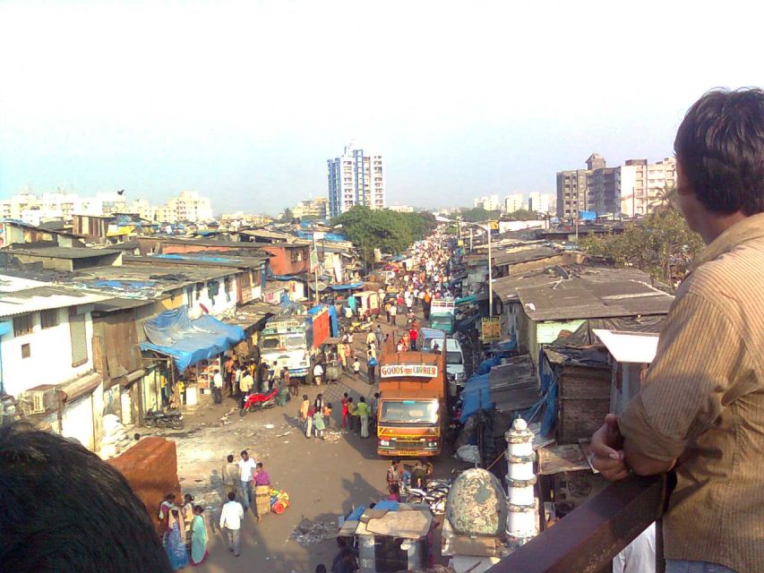 Bollywood tour with Slum Tour & Dance show - Walking through Dharavi’s working lanes