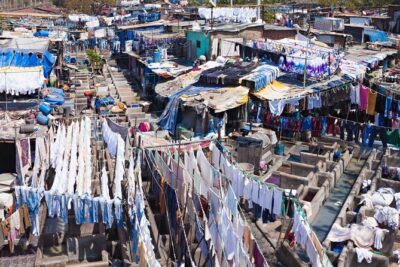 Dabbawala, Dhobi Ghat & Dharavi slum Tour with Local Train Ride