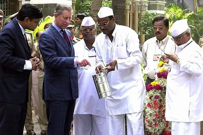Dabbawala, Dhobi Ghat & Dharavi slum Tour with Local Train Ride - Mahalaxmi Dhobi Ghat and Mumbai’s open-air laundry