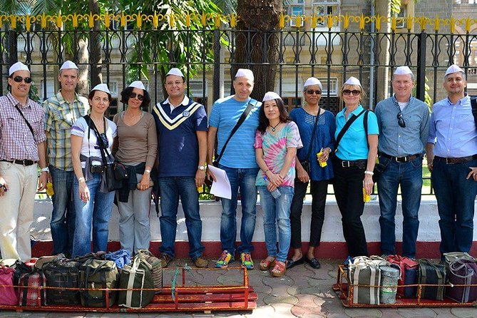 Dabbawala, Dhobi Ghat & Dharavi slum Tour with Local Train Ride - What the small group changes