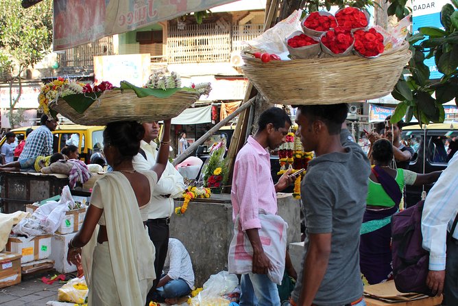 Experience the Off Beat and Alternative Tour of Mumbai! - Public transport, snacks, and the real value of $39.72