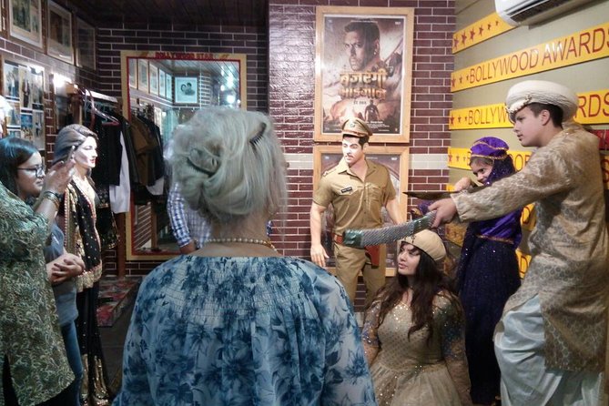 Full-Day Private Slum and Bollywood Tour with DANCE. - Entering a live Bollywood studio