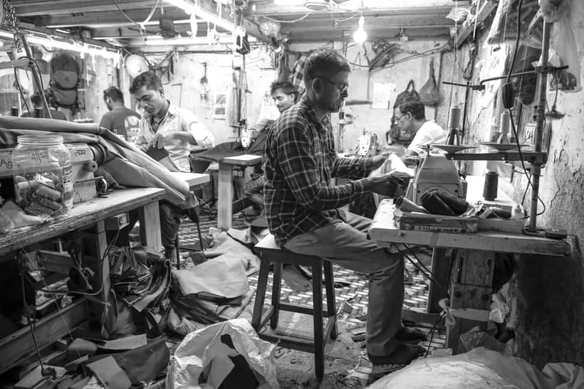 Mumbai Dharavi Slum Community Tour - Homes above, beside, and behind the workshops