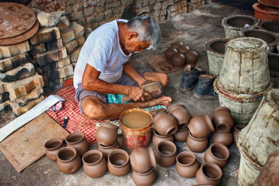 Mumbai: Dharavi Slum Slumdog Millionaire Tour with a Local - Recycling, pottery, textiles, and small industry