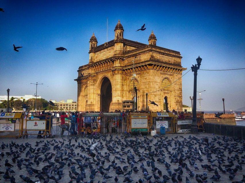 Mumbai: Elephanta Caves Half-Day Guided Tour with Expert - Reaching the caves by toy train and steps