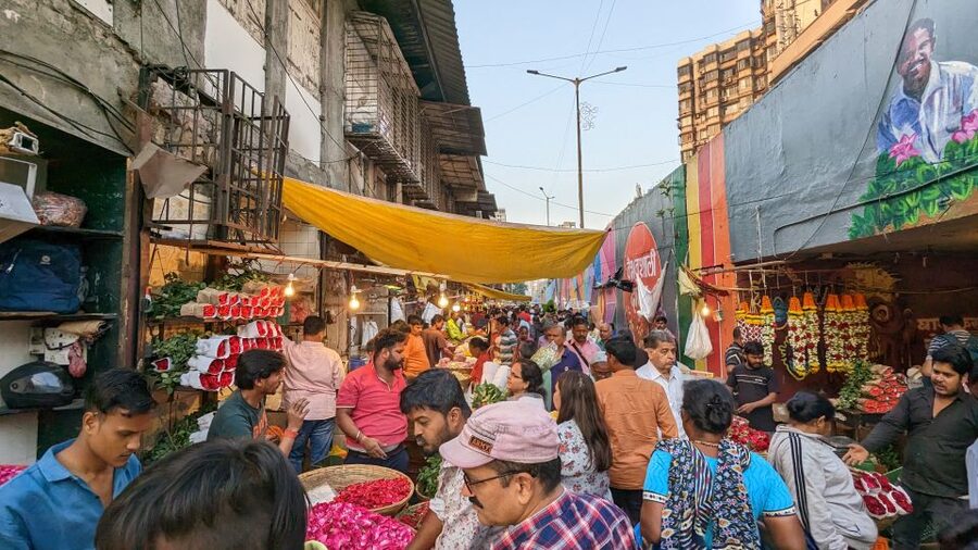 Mumbai Hidden Gems : Early Morning Tour with Expert Guide - Paper distribution near the train station