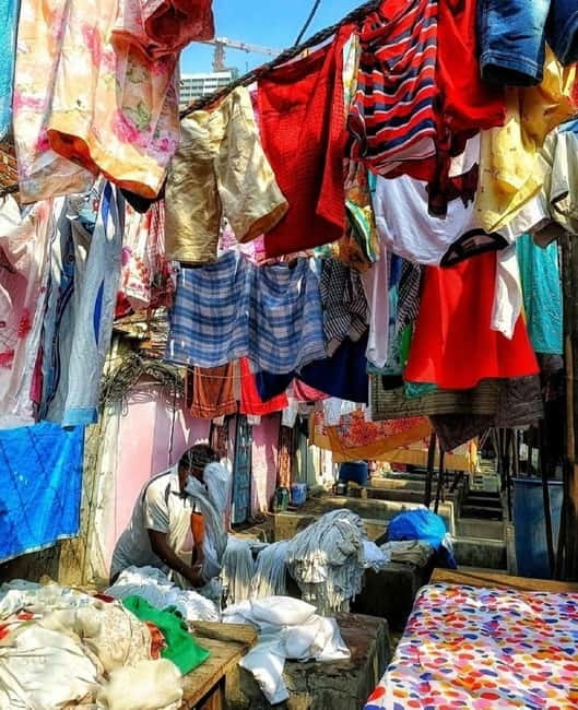 Mumbai: Private Dhobi Ghat Laundry & Slum Tour with Pickup - Entering Dharavi with a local guide