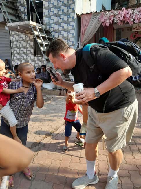 Mumbai Slum Tour - Visit Dharavi Slum with Local Guide - Clothing, comfort, and respectful conduct