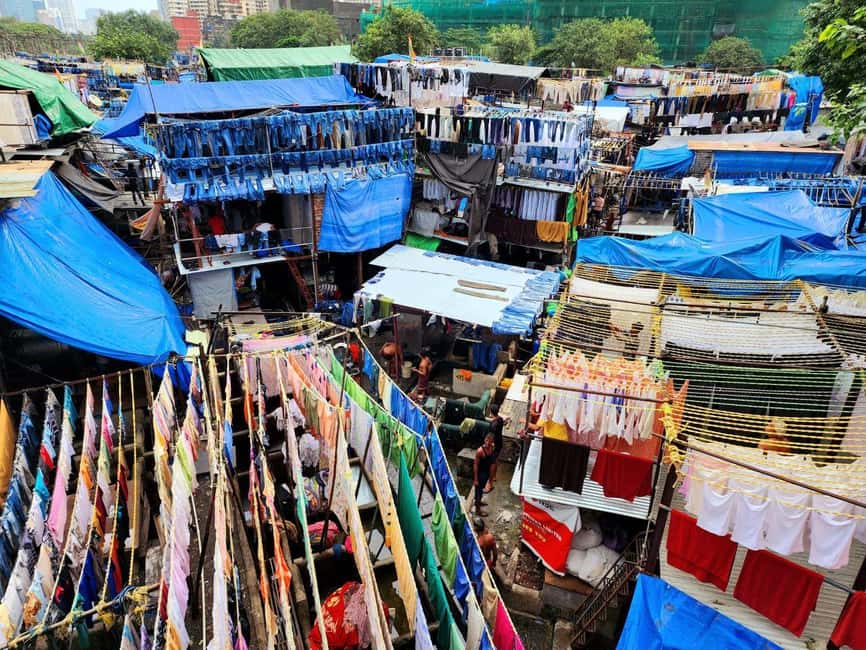 Private Full-Day Mumbai Sightseeing & Dharavi Slum Tour - Mani Bhavan, Banganga Tank, and Malabar Hill